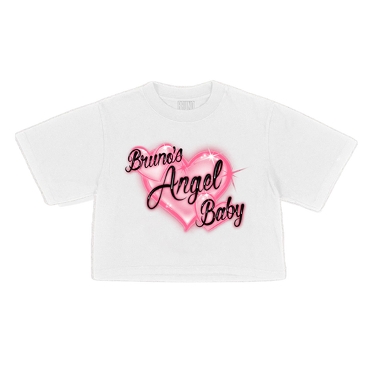 A white short-sleeve t-shirt, featuring the text 'Bruno's Angel Baby' printed in a black cursive font across large pink hearts.